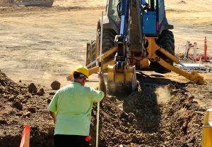 Backhoe cuts fiber line